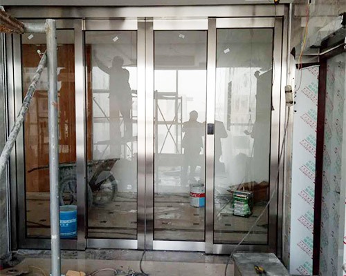 不銹鋼有框玻璃地簧門